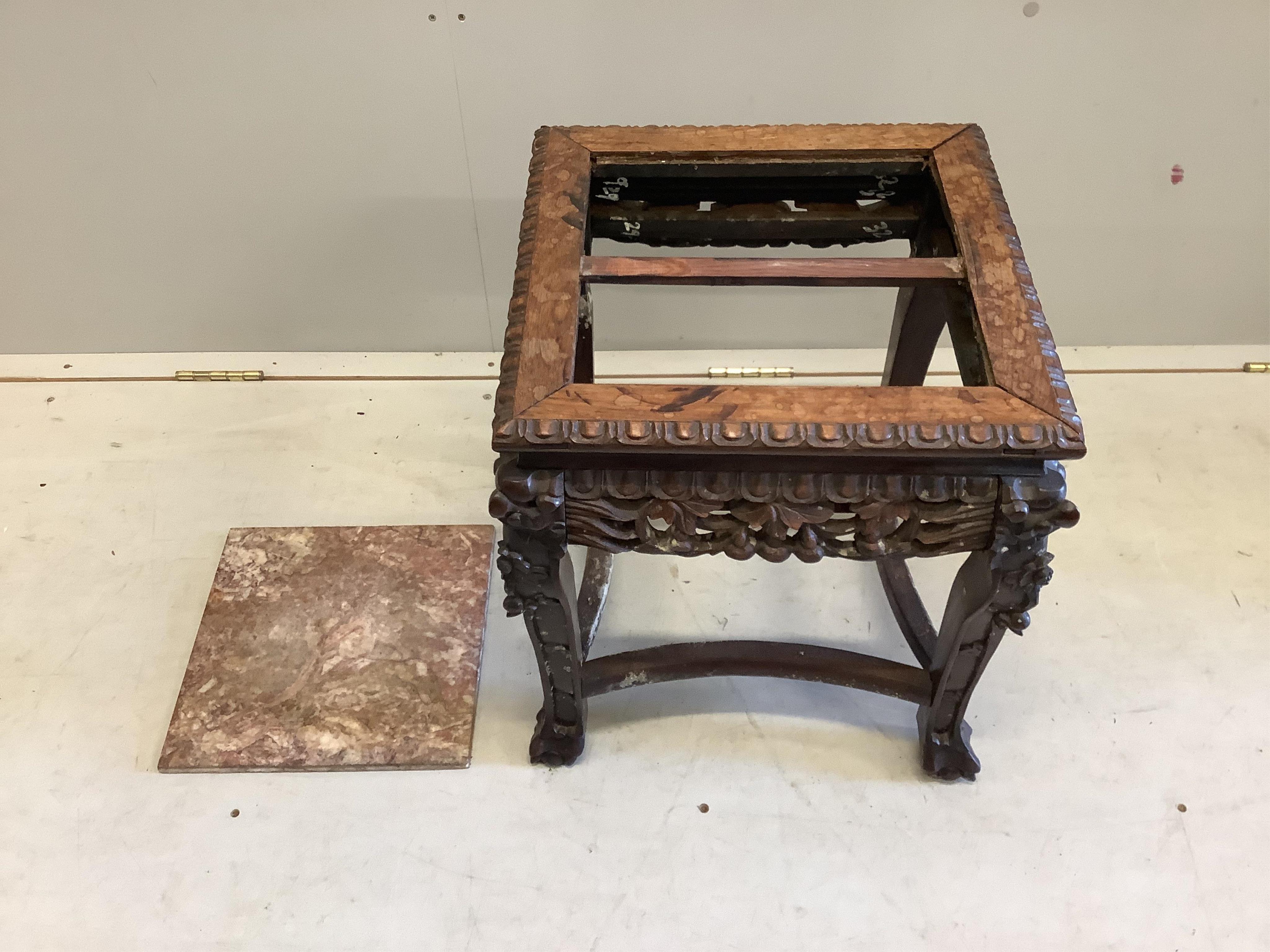 A late 19th century Chinese rouge marble topped hardwood vase stand, width 42cm, depth 42cm, height 46cm